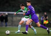 27 January 2024; Darragh Burns of Shamrock Rovers is tackled by Sean McHale of Wexford during the pre-season friendly match between Shamrock Rovers and Wexford at Roadstone Group Sports Club in Dublin. Photo by Stephen McCarthy/Sportsfile
