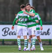 27 January 2024; Aaron Greene is congratulated by his Shamrock Rovers team-mate Darragh Burns, 21, after scoring their side's first goal during the pre-season friendly match between Shamrock Rovers and Wexford at Roadstone Group Sports Club in Dublin. Photo by Stephen McCarthy/Sportsfile