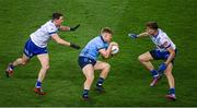 27 January 2024; Cian Murphy of Dublin in action against Ryan Wylie, left, and Joel Wilson of Monaghan during the Allianz Football League Division 1 match between Dublin and Monaghan at Croke Park in Dublin. Photo by Ray McManus/Sportsfile