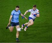 27 January 2024; Sean Bugler of Dublin in action against Micheál Bannigan of Monaghan during the Allianz Football League Division 1 match between Dublin and Monaghan at Croke Park in Dublin. Photo by Ray McManus/Sportsfile