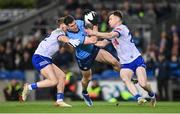 27 January 2024; Lee Gannon of Dublin in action against Monaghan players Michael Hamill, left, and Darragh Treanor during the Allianz Football League Division 1 match between Dublin and Monaghan at Croke Park in Dublin. Photo by Seb Daly/Sportsfile