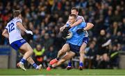 27 January 2024; Con O'Callaghan of Dublin is fouled by Ryan Wylie of Monaghan during the Allianz Football League Division 1 match between Dublin and Monaghan at Croke Park in Dublin. Photo by Seb Daly/Sportsfile