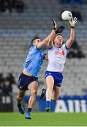 27 January 2024; Kieran Duffy of Monaghan in action against James McCarthy of Dublin during the Allianz Football League Division 1 match between Dublin and Monaghan at Croke Park in Dublin. Photo by Seb Daly/Sportsfile