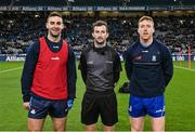 27 January 2024; Referee Paul Faloon with team captains James McCarthy of Dublin, left, and David Garland of Monaghan before the Allianz Football League Division 1 match between Dublin and Monaghan at Croke Park in Dublin. Photo by Seb Daly/Sportsfile