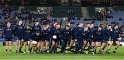 27 January 2024; Dublin players break from the team photograph before the Allianz Football League Division 1 match between Dublin and Monaghan at Croke Park in Dublin. Photo by Seb Daly/Sportsfile