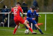 27 January 2024; Callum Costello of Waterford in action against Sean Cummins of Shelbourne during the pre-season friendly match between Shelbourne and Waterford at AUL Complex in Clonsaugh, Dublin. Photo by Seb Daly/Sportsfile