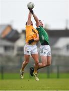 28 January 2024; Ronan Boyle of Antrim in action against Barry Coleman of Limerick during the Allianz Football League Division 3 match between Limerick and Antrim at Mick Neville Park in Rathkeale, Limerick. Photo by Tom Beary/Sportsfile