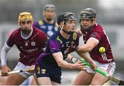 28 January 2024; Corey Byrne Dunbar of Wexford in action against Alex Connaire of Galway, right, during the Dioralyte Walsh Cup Final match between Wexford and Galway at Netwatch Cullen Park in Carlow. Photo by Seb Daly/Sportsfile