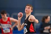 28 January 2024; Alex Lonergan of Menapians AC, Wexford, competes in the shot put of the under 16 boys combined events  during day two of 123.ie National Indoor Combined Events at the Sport Ireland National Indoor Arena in Dublin. Photo by Sam Barnes/Sportsfile