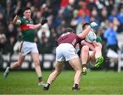 28 January 2024; Ryan O'Donoghue of Mayo in action against Johnny McGrath of Galway during the Allianz Football League Division 1 match between Galway and Mayo at Pearse Stadium in Galway. Photo by Piaras Ó Mídheach/Sportsfile