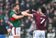 28 January 2024; Aidan O'Shea of Mayo and Kieran Molloy of Galway tussle during the Allianz Football League Division 1 match between Galway and Mayo at Pearse Stadium in Galway. Photo by Piaras Ó Mídheach/Sportsfile