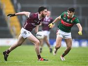 28 January 2024; Eoghan Kelly of Galway in action against Tommy Conroy of Mayo during the Allianz Football League Division 1 match between Galway and Mayo at Pearse Stadium in Galway. Photo by Piaras Ó Mídheach/Sportsfile