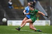 28 January 2024; Marion Farrelly of Meath shoots to score her side's second goal despite the tackle from Martha Byrne of Dublin during the Lidl LGFA National League Division 1 Round 2 match between Meath and Dublin at Páirc Tailteann in Navan, Meath. Photo by David Fitzgerald/Sportsfile
