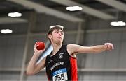 28 January 2024; Josh Nolan of Menapians AC, Wexford, competes in the shot put of the under 16  boys combined events during day two of 123.ie National Indoor Combined Events at the Sport Ireland National Indoor Arena in Dublin. Photo by Sam Barnes/Sportsfile