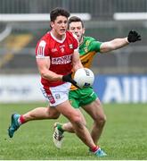 28 January 2024; Colm O'Callaghan of Cork in action against Eoghan Ban Gallagher of Donegal during the Allianz Football League Division 2 match between Donegal and Cork at MacCumhaill Park in Ballybofey, Donegal. Photo by Ramsey Cardy/Sportsfile