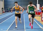 28 January 2024; Fionn Naughton of Leevale AC,  Cork, left, and Kyle Byrne-Ward of Newbridge AC, Kildare, compete in the 800m of the under 15 boys combined events during day two of 123.ie National Indoor Combined Events at the Sport Ireland National Indoor Arena in Dublin. Photo by Sam Barnes/Sportsfile