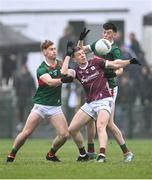 28 January 2024; Dylan McHugh of Galway in action against Jack Carney, left, and Bob Tuohy of Mayo during the Allianz Football League Division 1 match between Galway and Mayo at Pearse Stadium in Galway. Photo by Piaras Ó Mídheach/Sportsfile