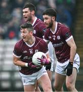 28 January 2024; Johnny Heaney of Galway, supported by team-mates Eoghan Kelly, 4, and Seán Mulkerrin during the Allianz Football League Division 1 match between Galway and Mayo at Pearse Stadium in Galway. Photo by Piaras Ó Mídheach/Sportsfile
