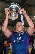 28 January 2024; Wexford captain Lee Chin lifts the Walsh Cup after his side's victory in the Dioralyte Walsh Cup Final match between Wexford and Galway at Netwatch Cullen Park in Carlow. Photo by Seb Daly/Sportsfile