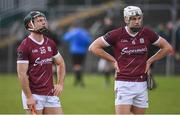 28 January 2024; Galway players Gearoid McInerney, left, and Seán Linnane after their side's defeat in the Dioralyte Walsh Cup Final match between Wexford and Galway at Netwatch Cullen Park in Carlow. Photo by Seb Daly/Sportsfile