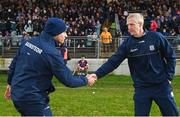 28 January 2024; Wexford manager Keith Rossiter and Galway manager Henry Shefflin shake hands after the Dioralyte Walsh Cup Final match between Wexford and Galway at Netwatch Cullen Park in Carlow. Photo by Seb Daly/Sportsfile