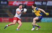 28 January 2024; Michael McKernan of Tyrone in action against Keith Doyle of Roscommon during the Allianz Football League Division 1 match between Tyrone and Roscommon at O’Neills Healy Park in Omagh, Tyrone. Photo by Ben McShane/Sportsfile
