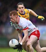 28 January 2024; Seanie O'Donnell of Tyrone in action against David Murray of Roscommon during the Allianz Football League Division 1 match between Tyrone and Roscommon at O’Neills Healy Park in Omagh, Tyrone. Photo by Ben McShane/Sportsfile