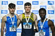 28 January 2024; Senior men's heptathlon medallists Jack Forde of St Killians AC, Wexford, gold, centre, Evan Hayes of Waterford AC, silver, left, andd Taiwo Adereni of Waterford AC, bronze, right, during day two of 123.ie National Indoor Combined Events at the Sport Ireland National Indoor Arena in Dublin. Photo by Sam Barnes/Sportsfile