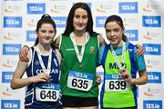 28 January 2024; Girls u14 pentathlon medallists, Nell O'Connell of Blarney/Inniscara AC, Cork, gold, centre, Ruby Cunnane of Corran AC, Sligo, silver, left, and Cara Gorman of Metro/St Brigids AC, Dublin, bronze, right, during day two of 123.ie National Indoor Combined Events at the Sport Ireland National Indoor Arena in Dublin. Photo by Sam Barnes/Sportsfile