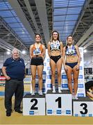 28 January 2024; Athletic's Ireland president John Cronin, far left, with Senior women's pentathlon medallists, Lara O Byrne of Donore Harriers AC, Dublin, gold, centre, Laura Frawley of Nenagh Olympic AC, Tipperary, silver, left, and Laura Frey of Lagan Valley AC, Antrim, bronze, right, during day two of 123.ie National Indoor Combined Events at the Sport Ireland National Indoor Arena in Dublin. Photo by Sam Barnes/Sportsfile