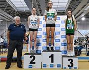 28 January 2024; Athletic's Ireland president John Cronin, far left with girl's u15 pentathlon medallists, Cara Ryan of Clonmel AC, Tipperary, gold, centre, Nicole Flanagan of Sligo AC, silver, left, and Rachel Treacy of Tuam AC, Galway, bronze, right, during day two of 123.ie National Indoor Combined Events at the Sport Ireland National Indoor Arena in Dublin. Photo by Sam Barnes/Sportsfile
