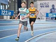 28 January 2024; Fionn Naughton of Leevale AC, Cork, right, competes in the 800m of the boys u15 pentathlon during day two of 123.ie National Indoor Combined Events at the Sport Ireland National Indoor Arena in Dublin. Photo by Sam Barnes/Sportsfile