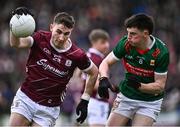 28 January 2024; Matthew Tierney of Galway in action against Bob Tuohy of Mayo during the Allianz Football League Division 1 match between Galway and Mayo at Pearse Stadium in Galway. Photo by Piaras Ó Mídheach/Sportsfile