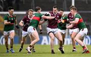 28 January 2024; Céin Darcy of Galway in action against Eoghan McLaughlin, left, and David McBrien of Mayo during the Allianz Football League Division 1 match between Galway and Mayo at Pearse Stadium in Galway. Photo by Piaras Ó Mídheach/Sportsfile