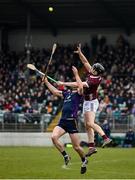 28 January 2024; Kevin Cooney of Galway in action against Conor Foley of Wexford during the Dioralyte Walsh Cup Final match between Wexford and Galway at Netwatch Cullen Park in Carlow. Photo by Seb Daly/Sportsfile