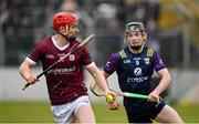 28 January 2024; Tom Monaghan of Galway in action against Corey Byrne Dunbar of Wexford during the Dioralyte Walsh Cup Final match between Wexford and Galway at Netwatch Cullen Park in Carlow. Photo by Seb Daly/Sportsfile