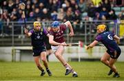 28 January 2024; Greg Thomas of Galway in action against Wexford players Conor Hearne, left, and Damien Reck during the Dioralyte Walsh Cup Final match between Wexford and Galway at Netwatch Cullen Park in Carlow. Photo by Seb Daly/Sportsfile