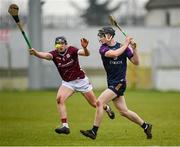28 January 2024; Corey Byrne Dunbar of Wexford in action against Ian McGlynn of Galway during the Dioralyte Walsh Cup Final match between Wexford and Galway at Netwatch Cullen Park in Carlow. Photo by Seb Daly/Sportsfile