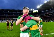 21 January 2024; Glen players Ryan Dougan, left, and Eunan Mulholland celebrate after their side's victory in the AIB GAA Football All-Ireland Senior Club Championship Final match between Glen of Derry and St Brigid's of Roscommon at Croke Park in Dublin. Photo by Piaras Ó Mídheach/Sportsfile