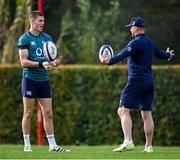 29 January 2024; Sam Prendergast, left, with assistant coach Mike Catt during an Ireland Rugby squad training session at The Campus in Quinta da Lago, Portugal. Photo by Brendan Moran/Sportsfile
