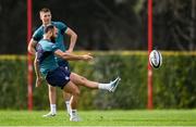 29 January 2024; Jamison Gibson-Park, watched by Sam Prendergast, during an Ireland Rugby squad training session at The Campus in Quinta da Lago, Portugal. Photo by Brendan Moran/Sportsfile