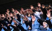 29 January 2024; St Michael's College supporters celebrate after their side's victory in the Bank of Ireland Leinster Schools Senior Cup first round match between St Michael's College and St Vincent's Castleknock College at Energia Park in Dublin. Photo by Piaras Ó Mídheach/Sportsfile