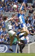 18 July 2004; Conor Hughes, Kildare, in action against Brendan Quigley, Laois. Leinster Minor Football Championship Final, Laois v Kildare, Croke Park, Dublin. Picture credit; Brian Lawless / SPORTSFILE