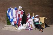 18 July 2004; A flag seller on North Circular Road in advance of the game. Bank of Ireland Leinster Senior Football Championship Final, Laois v Westmeath, Croke Park, Dublin. Picture credit; Ray McManus / SPORTSFILE