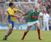 18 July 2004; Ciaran McDonald, Mayo, in action against Francie Grehan, Roscommon. Bank of Ireland Connacht Senior Football Championship Final, Mayo v Roscommon, McHale Park, Castlebar, Co. Mayo. Picture credit; Damien Eagers / SPORTSFILE