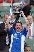 18 July 2004; Craig Rogers, Laois, lifts the cup after victory in the final. Leinster Minor Football Championship Final, Laois v Kildare, Croke Park, Dublin. Picture credit; Brian Lawless / SPORTSFILE