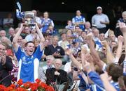 18 July 2004;  Laois captain Craig Rogers celebrates with the cup after victory over Kildare. Leinster Minor Football Championship Final, Laois v Kildare, Croke Park, Dublin. Picture credit; David Maher / SPORTSFILE