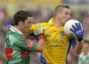 18 July 2004; Jonathon Dunning, Roscommon, in action against Conor Moran, Mayo. Bank of Ireland Connacht Senior Football Championship Final, Mayo v Roscommon, McHale Park, Castlebar, Co. Mayo. Picture credit; Pat Murphy / SPORTSFILE