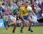 18 July 2004; Jonathon Dunning, Roscommon, in action against Conor Moran, Mayo. Bank of Ireland Connacht Senior Football Championship Final, Mayo v Roscommon, McHale Park, Castlebar, Co. Mayo. Picture credit; Damien Eagers / SPORTSFILE