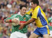 18 July 2004; Conor Moran, Mayo, in action against Francie Grehan, Roscommon. Bank of Ireland Connacht Senior Football Championship Final, Mayo v Roscommon, McHale Park, Castlebar, Co. Mayo. Picture credit; Pat Murphy / SPORTSFILE